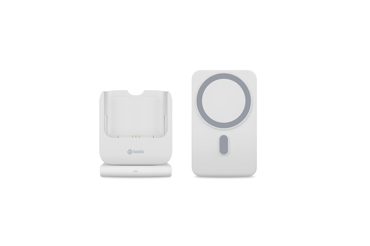 White charging station base with separate battery unit on desktop stand