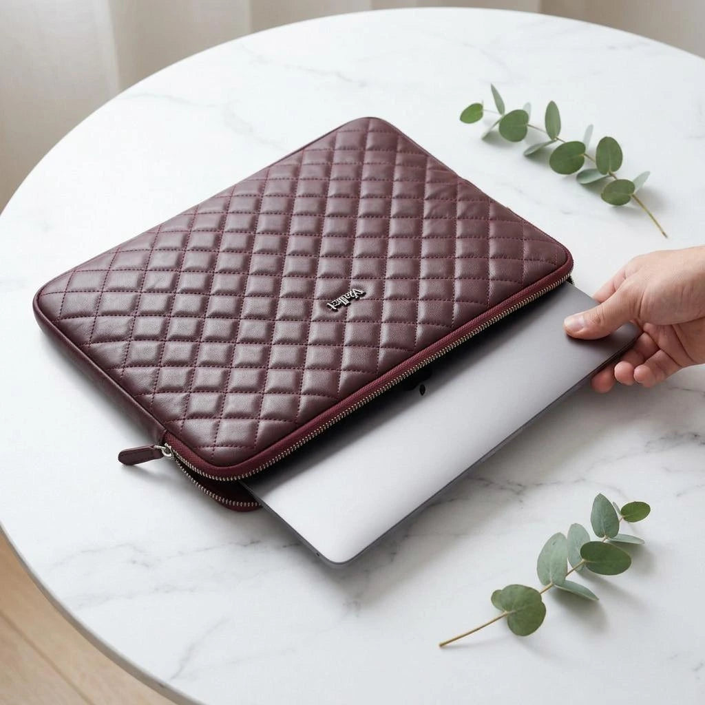 7Wallet 14-Inch Genuine Quilted Leather Laptop Sleeve in Burgundy opened with laptop sliding in