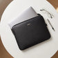 7Wallet 14-Inch Premium Epi Leather Laptop Sleeve in Black top-down view with laptop half inserted