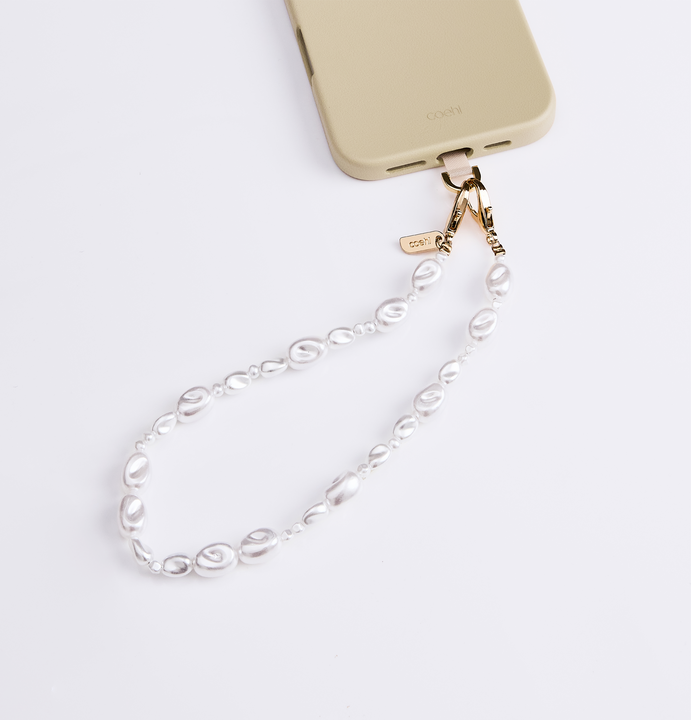 UNIQ COEHL PERLA UNIVERSAL PHONE CHARM HANDSTRAP - PEARL WHITE