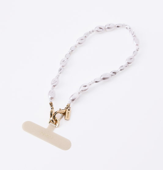 UNIQ COEHL PERLA UNIVERSAL PHONE CHARM HANDSTRAP - PEARL WHITE